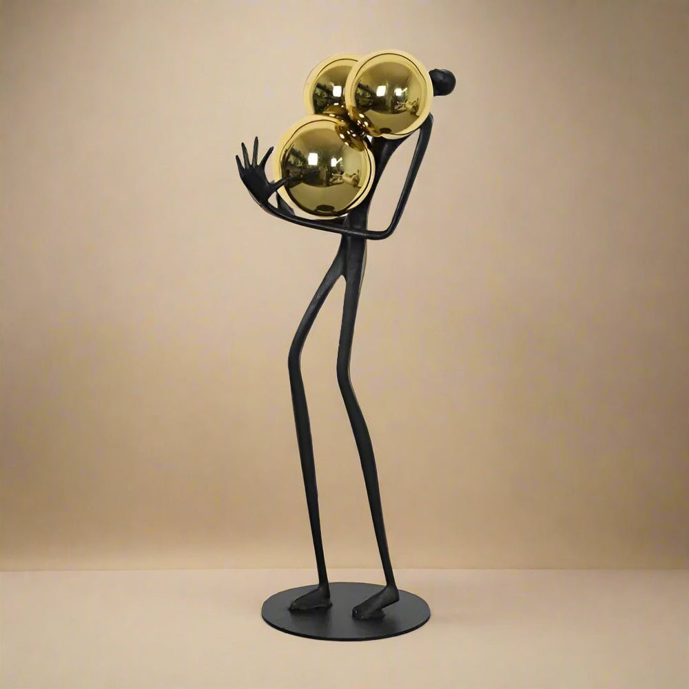 The Balancing Act Statue - Palatium Lux
