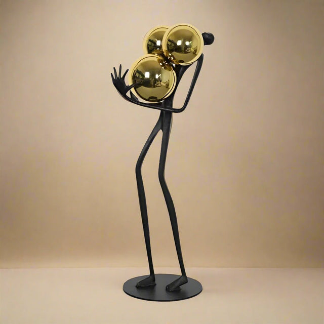 The Balancing Act Statue - Palatium Lux
